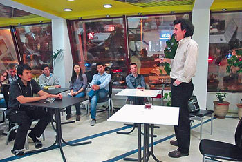 Rustam Burnashev (standing), a leading expert on Central Asia, talks about principles of regional cooperation during a Cafe Scientifique session. 1373471705