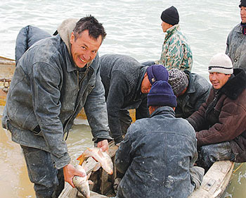 Fishermen communities are seeing bigger catches and brighter future as water levels rise. 1358993787