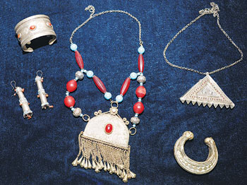 Kazakh traditional jewelry made from natural materials fascinates by its beauty. 1361322268