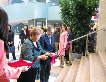 Asima Bimendina and Jean-Charles Berthonnet cut the ribbon at the official opening of the exhibition. 1361324157