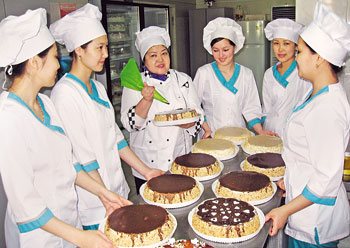 Balziya Yeveneyeva teaches her students how to make the sweetest cake ever. 1371056422