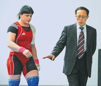 The Kazakhstan National Weightlifting Team trained by Head Coach Alexey Ni (right) has shown great results during the Asian Championship held in Astana recently. 1373472520