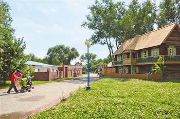 A picturesque ethnic village represents unique cultural aspects of housing of different ethnicities living in East Kazakhstan. 1374713183