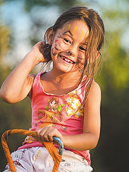 One of the young participants of the pink zone demonstrates her body painting. 1378912206